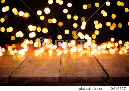 Blurred abstract golden spot lights with wood Blurred abstract golden spot lights with wood 40416837