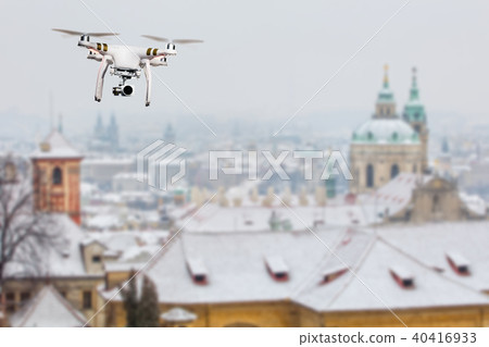 Drone flying above Prague city Drone flying above Prague city 40416933
