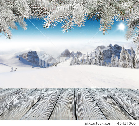 Empty wooden planks with winter alpine mountains Empty wooden planks with winter alpine mountains 40417066