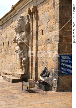 Dwarapala and Ganesha on left side of the entrance 40419804