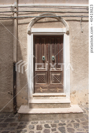 Old closed wooden door. Castelsardo, Sardinia, Ita Old closed wooden door. Castelsardo, Sardinia, Ita 40419823
