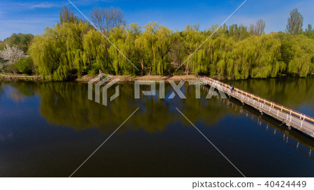 Aerial view of lake in the city. Spring. Aerial view of lake in the city. Spring. 40424449