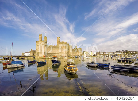 The skyline of Caernafon in Wales during high tide - United Kingdom The skyline of Caernafon in Wales during high tide - United Kingdom 40426294