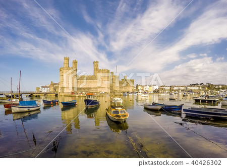 The skyline of Caernafon in Wales during high tide - United Kingdom The skyline of Caernafon in Wales during high tide - United Kingdom 40426302