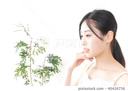 A young woman doing skin care A young woman doing skin care 40426756