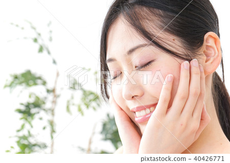 A young woman doing skin care A young woman doing skin care 40426771