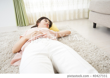 Young woman sleeping at home Young woman sleeping at home 40427331