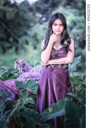Asia beauty Girl Outdoors enjoying nature. Asia beauty Girl Outdoors enjoying nature. 40428220