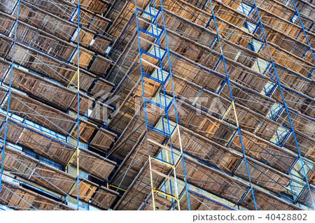 Construction site of building with scaffoldings 40428802