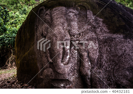 Elephants carved on large stones. 40432181