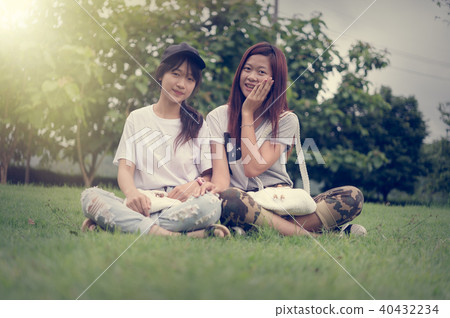 two asia young girl with bag on park two asia young girl with bag on park 40432234