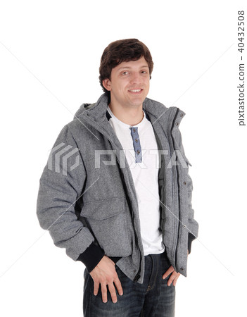 Serious looking young man standing Serious looking young man standing 40432508