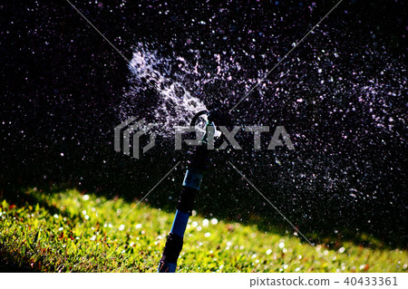 Sprinkler and spread water. Sprinkler and spread water. 40433361