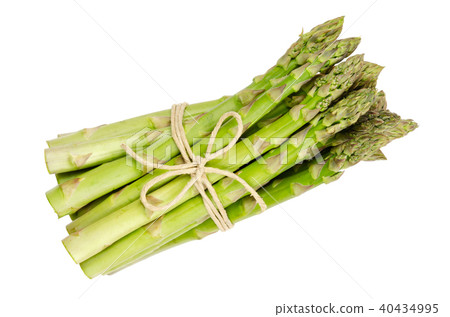 Bundle of fresh green asparagus shoots over white 40434995