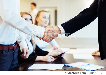Business men hand shake 40436130