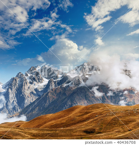 Snow-covered mountains in the mist. Autumn at Koruldi Lake 40436708