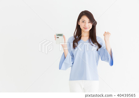 A woman with a calculator smile 40439565