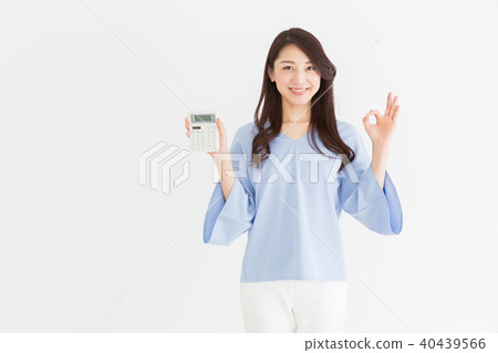 A woman with a calculator smile 40439566