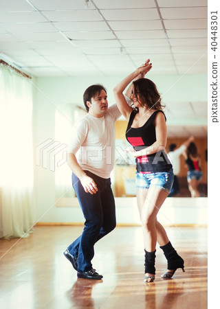 Beautiful couple of professional artists dancing passionate danc Beautiful couple of professional artists dancing passionate danc 40448301