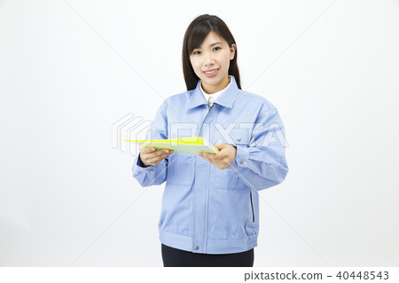 Woman dressed in work clothes Woman dressed in work clothes 40448543