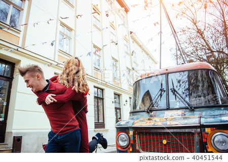 Couple enjoying outdoors in a urban surroundings Couple enjoying outdoors in a urban surroundings 40451544