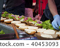 preparing hamburgers on the street 40453093