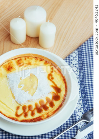 Delicious cheese casserole in a ceramic pot. Delicious cheese casserole in a ceramic pot. 40453243
