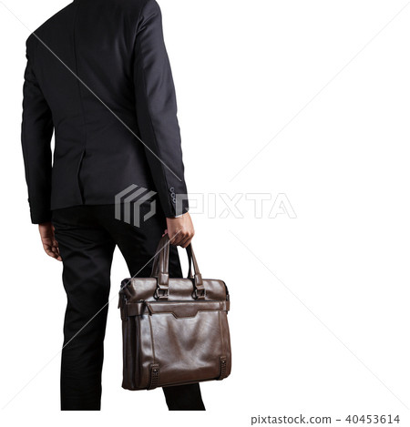 Businessman holding a briefcase Businessman holding a briefcase 40453614