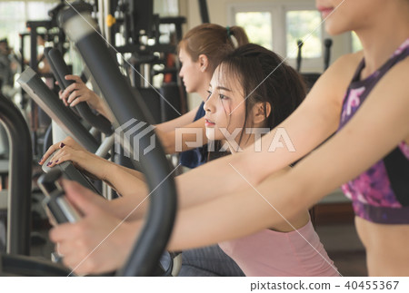 Group of Asian woman is working out in fitness gym 40455367