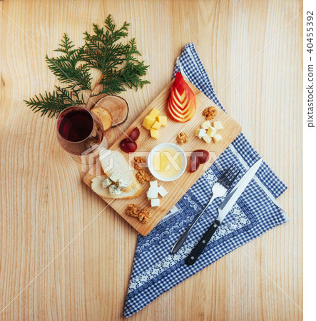 Red Wine And Assorted Cheese Plate with fruit Red Wine And Assorted Cheese Plate with fruit 40455392