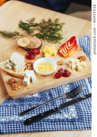 plate with blue cheese Dor, parmesan, Brie 40455438