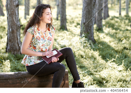 young girl in spring forest young girl in spring forest 40456454