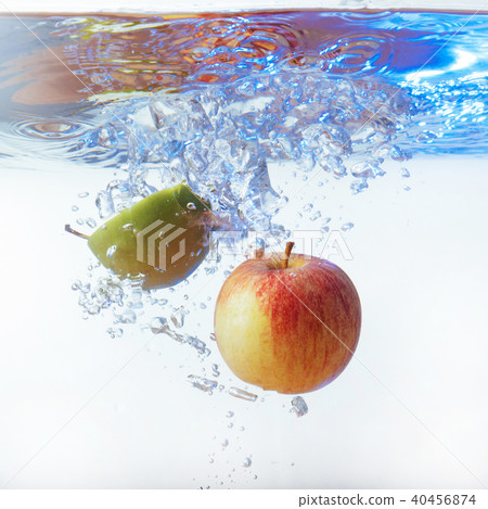 apple in water on a white background apple in water on a white background 40456874