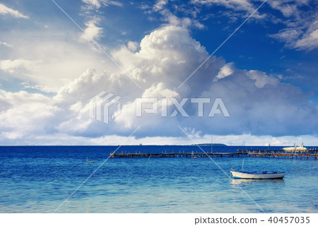 Beautiful summer scene of calm seas and boat Beautiful summer scene of calm seas and boat 40457035