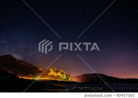 Starry Sky over the city by the sea Sicily. Italy Starry Sky over the city by the sea Sicily. Italy 40457565