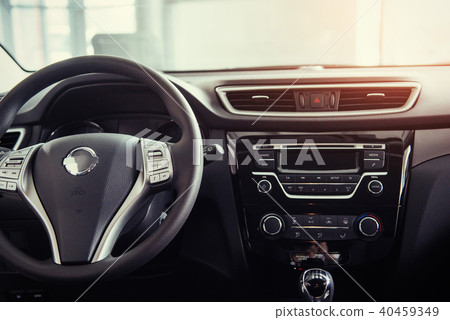 Modern car interior dashboard and steering wheel 40459349