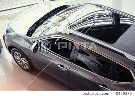 of the car in the spacious showroom with large windows 40459376