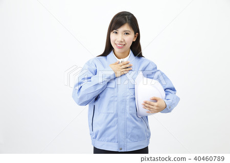 Woman dressed in work clothes Woman dressed in work clothes 40460789