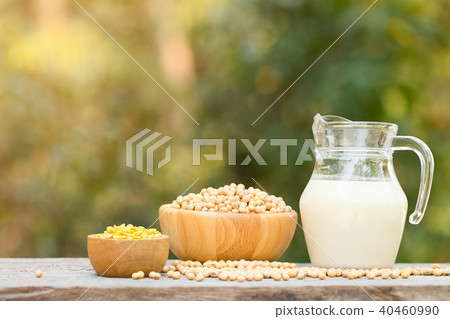 Soy milk and soy beans on wood background. 40460990