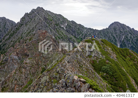 Ridge and climber from Nishiho Takadake to Okuo Ridge and climber from Nishiho Takadake to Okuo 40461317