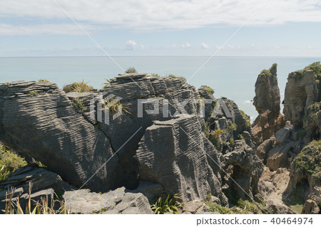 Pancake rock at Panakaiki seacoast New Zealand Pancake rock at Panakaiki seacoast New Zealand 40464974
