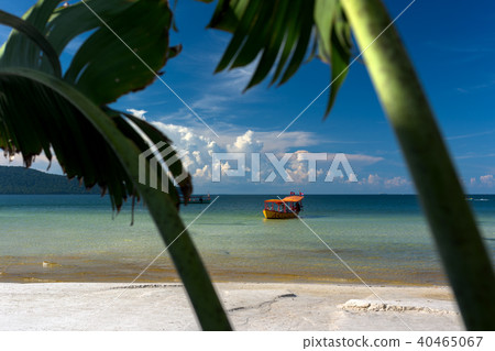 Yellow longtail boat moored at the beach Yellow longtail boat moored at the beach 40465067