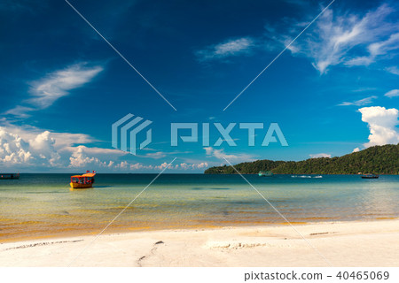 Yellow longtail boat moored at the beach Yellow longtail boat moored at the beach 40465069