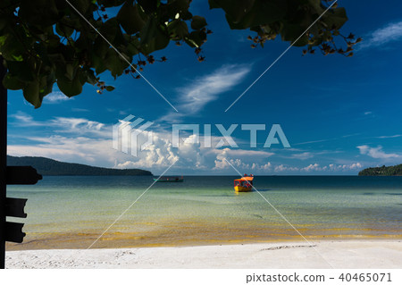 Yellow longtail boat moored at the beach Yellow longtail boat moored at the beach 40465071