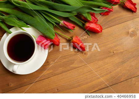 tulips are on wooden boards, cup of coffee tulips are on wooden boards, cup of coffee 40466958