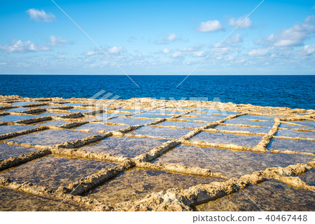 Salt evaporation ponds on Gozo island, Malta Salt evaporation ponds on Gozo island, Malta 40467448