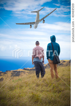 two men on the edge of the Rano Kau volcano two men on the edge of the Rano Kau volcano 40469509