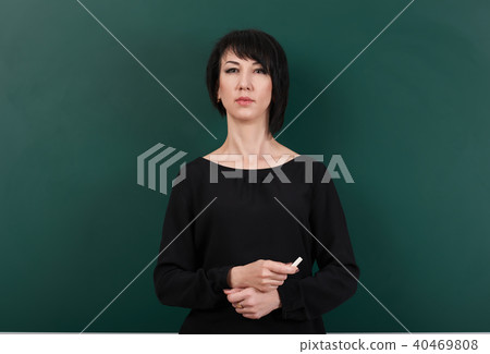 girl teacher posing chalk Board learning concept 40469808