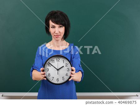 girl teacher posing chalk Board learning concept girl teacher posing chalk Board learning concept 40469875