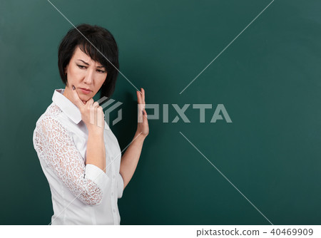 girl teacher posing chalk Board learning concept girl teacher posing chalk Board learning concept 40469909